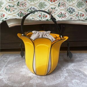 Kate Spade New York
medium petal leather bucket bag 🌼